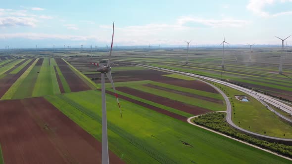 Aerial View of Wind Turbines Farm and Agricultural Fields. Austria.