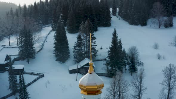 Aerial View of the Church in the Village in Winter