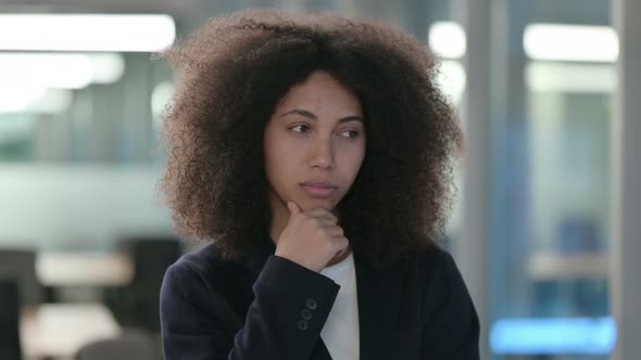 Portrait of Pensive African Businesswoman Thinking