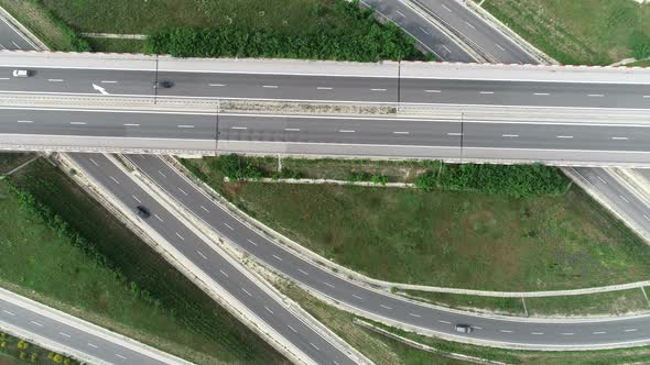 Aerial view of highway and overpass. Road junction, highway intersection top view