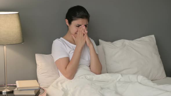 Upset Indian Woman Crying in Bed 
