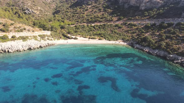 Aegean coast of Datca peninsula, coastline of Datca with small beach deep and crystal blue coves