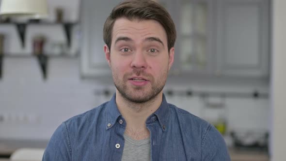 Portrait of Beard Young Man Doing Video Chat