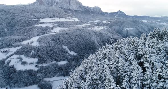 Flyover Italian Alps in Winter