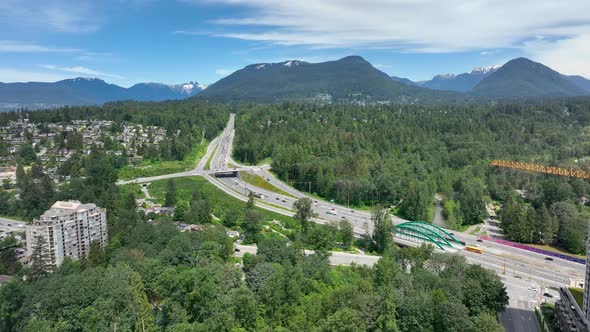 Vehicles Driving On Trans-Canada Highway At Daytime From Lynnmour, North Vancouver, BC, Canada. - ae