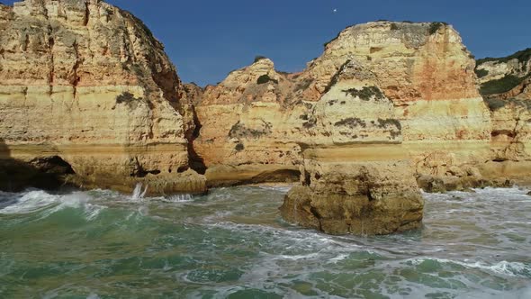 Aerial View on Rock and Waves in Algarve Portugal