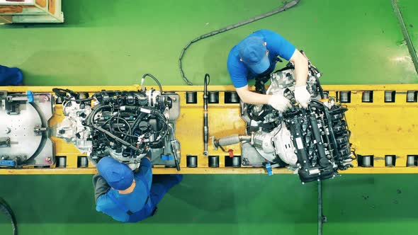 Top View of Car's Inner Elements Getting Assembled in Fast Motion. Car Assembly Line, Automobile