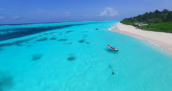 Daytime birds eye copy space shot of a summer white paradise sand beach and aqua turquoise water bac