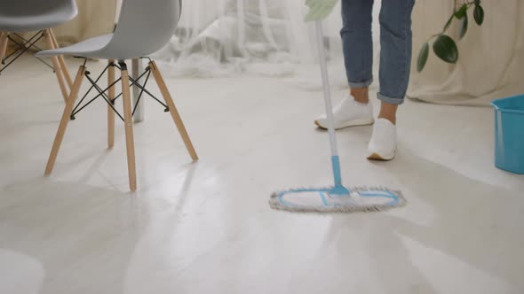 Sequence of Woman Mopping Floor at Home