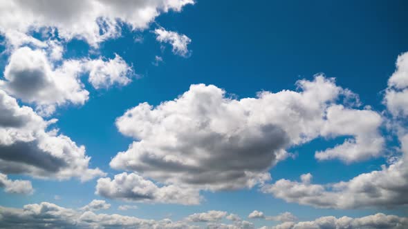 Clouds Move Smoothly in the Blue Sky. Timelapse. Cloud Space.