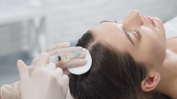 Beautician Holding Injection Doing Procedure for Hair