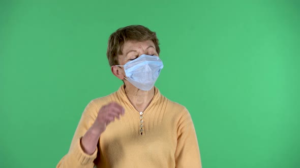 Portrait of Elderly Woman Takes Off His Medical Disposable Mask and Takes a Deep Breat, Isolated