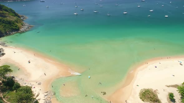 Aerial view drone camera of Beautiful tropical sea sandy beach and waves crashing against sand beach