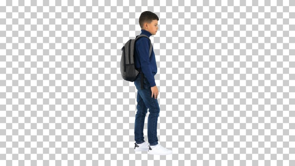 Boy in polo neck standing with a backpack, Alpha Channel