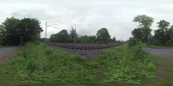 360 VR Two Trains and Empty Road in the Countryside of Frankfurt, Germany