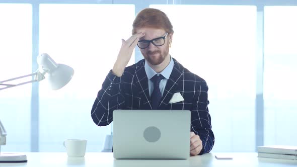 Redhead Businessman with Headache, Tension and Stress