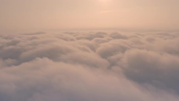 Fluffy Cumulus Clouds at Sunset