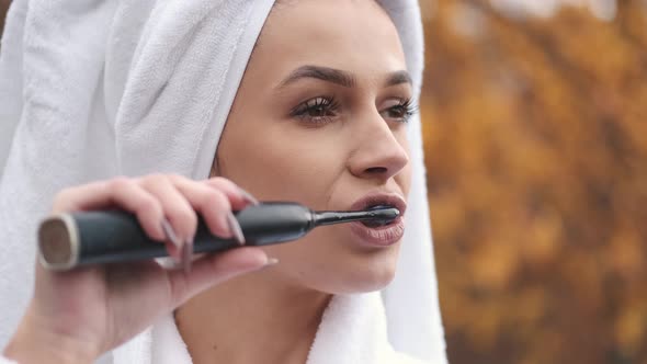 Woman Robe Towel Her Head Brushing Teeth Nature Hotel Balcony