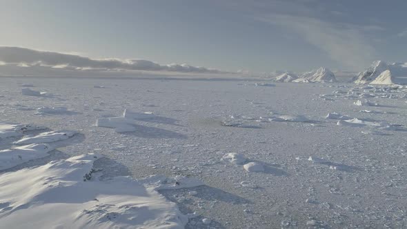 Antarctic Ocean Coast Frozen Brash Ice Aerial Shot