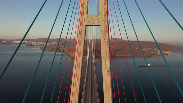 Flying Between Cables and Above the Road of Cablestayed Bridge