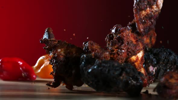 Smoked chicken wings falling and bouncing in ultra slow motion 1500fps - CHICKEN WINGS PHANTOM 037