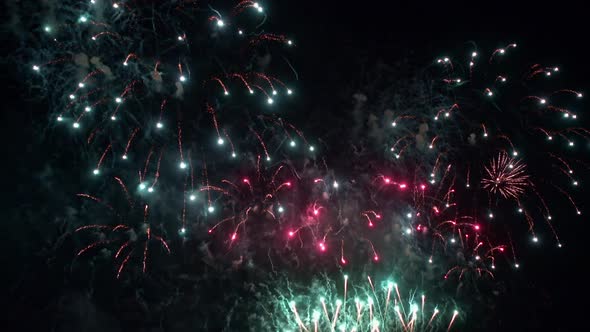 Colorful Firework display at night on sky background