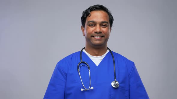 Happy Indian Male Doctor Showing Thumbs Up