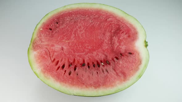 Half A Watermelon On White Surface