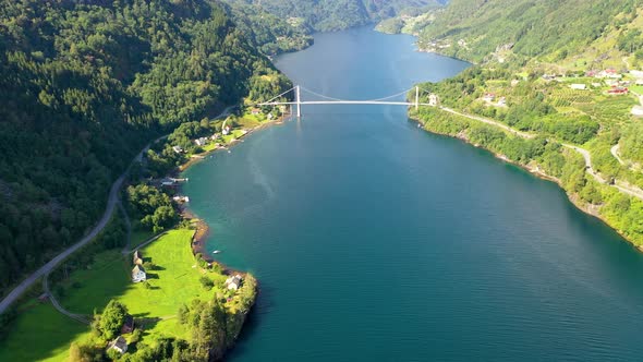 Aerial view of Fjord with beautiful lake and a bridge cutting across