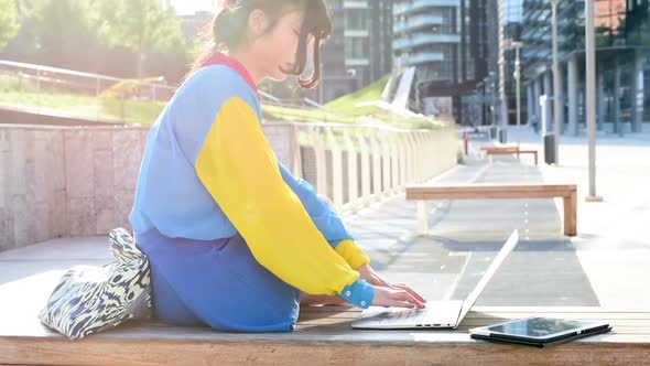 Young asiatic woman using computer