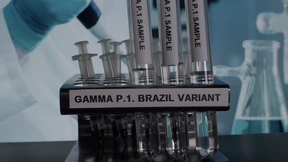 Gamma P.1 Brazil Variant Test Tube Sample Vials Being Taken Off In Rack.  Locked Off