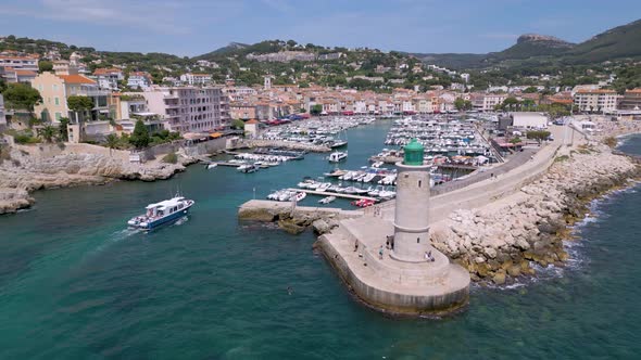 Drone shot of a lighthouse and port in Cassis, Provence, France