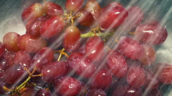 Juicy Grapes Are Washed In The Sink