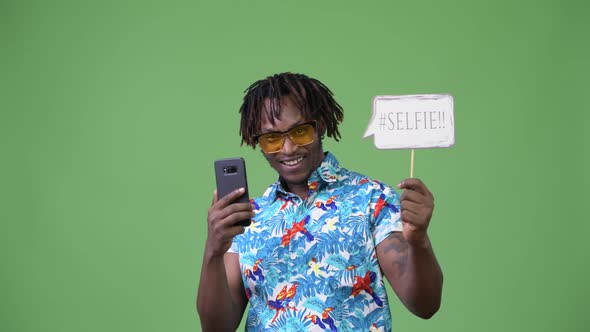 Young Handsome African Tourist Man Taking Selfie