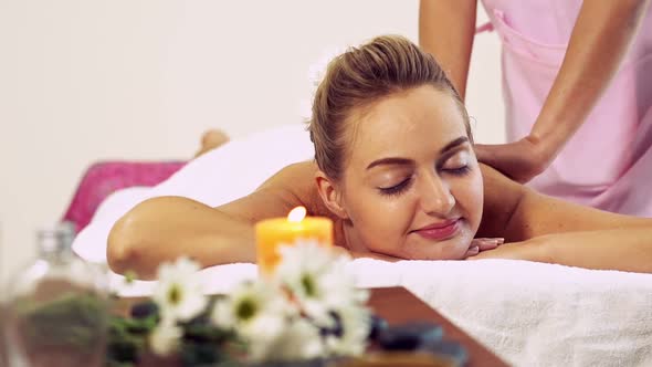 Woman Gets Back Massage Spa By Massage Therapist