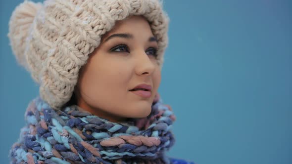 Happy Winter Woman in Warm Clothes Outdoors. Snow Falling in Super Slow Motion 180Fps  Footage.