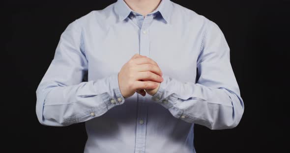 Man cracking his knuckles alt