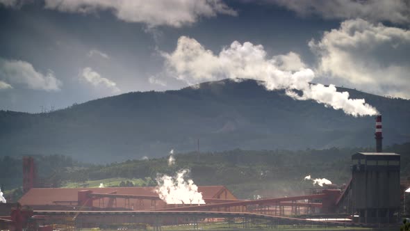 Factory With Smoking Chimneys.