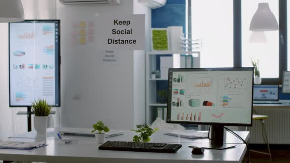 Modern Empty Office with Plastic Separators and Keep Social Distance Poster