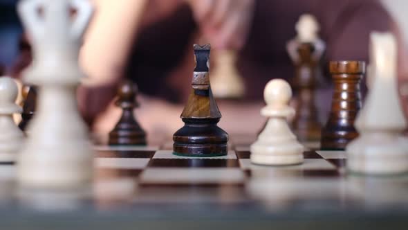 Unrecognizable Woman Playing Chess