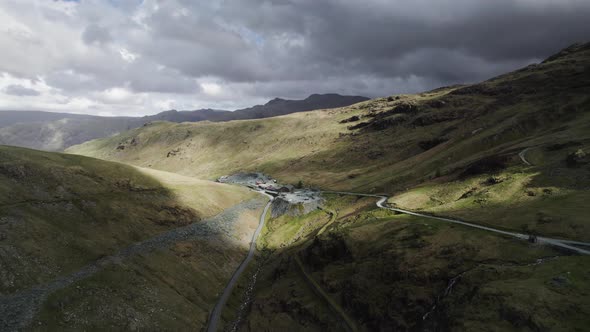 Honister slate mine at the top of Honister pass in the English Lake District. Sunlight breaks throug