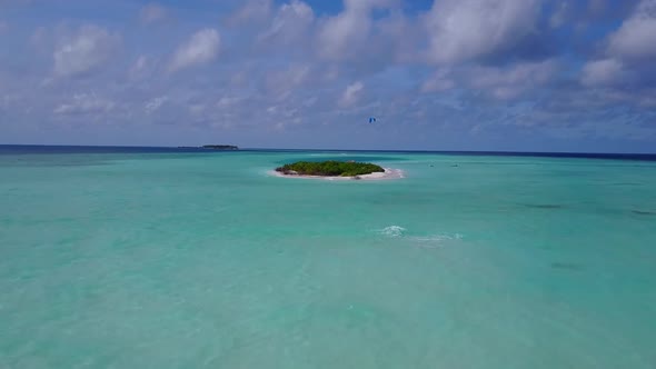 Drone aerial nature of tropical seashore beach by clear ocean with sand background