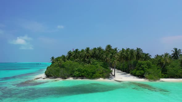 Wide fly over abstract view of a summer white paradise sand beach and turquoise sea background in vi