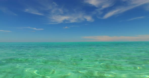 Tropical fly over copy space shot of a summer white paradise sand beach and blue ocean background in
