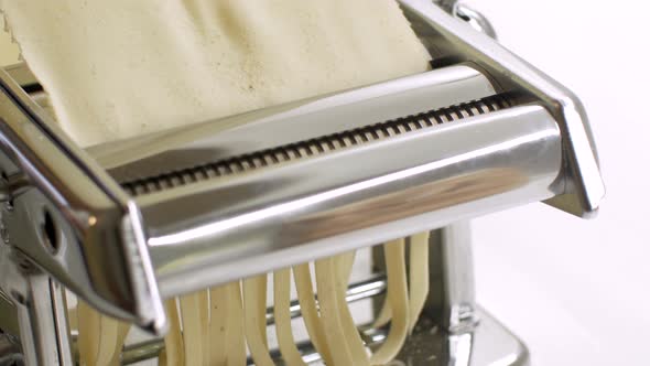 Homemade Making Pasta on a Cutting Machine
