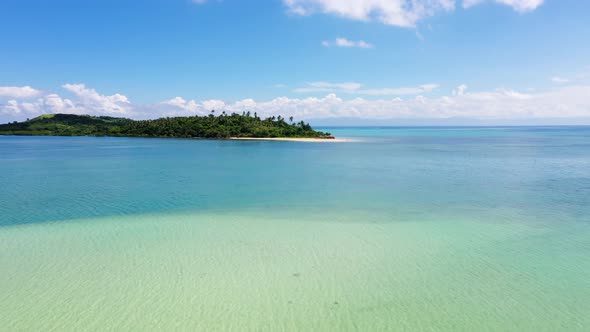 A Lagoon with a Coral Reef and a White Sandy Beach, Aerial Drone. Caramoan Islands, Philippines.