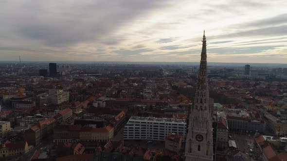 Aerial Flypast Shot Of Zagreb Cathedral's Gothic Spires At Sunset