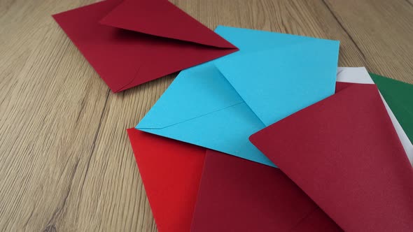 Falling multi-colored envelopes.
