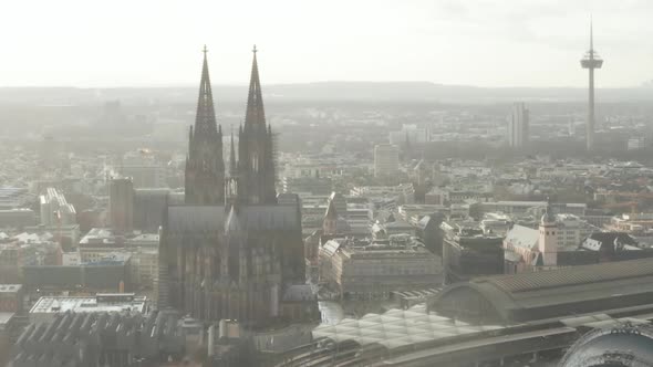 AERIAL: Cologne Hohenzollern Bridge and View on Cathedral with Central Train Station in Beautiful