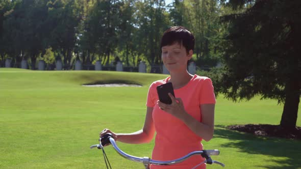 Women Using Smartphone Outdoor.  Video Prores